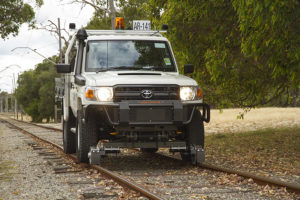 Toyota Land Cruiser with Aries Hyrail road-rail vehicle conversion for standard gauge rail