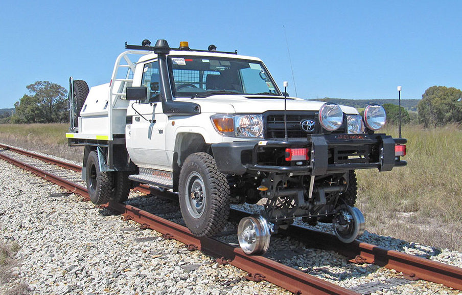 Toyota Land Cruiser with Aries Hyrail road-rail vehicle conversion for narrow gauge rail